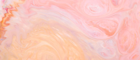 Soft pastel abstract background with pink peach swirls on liquid surface