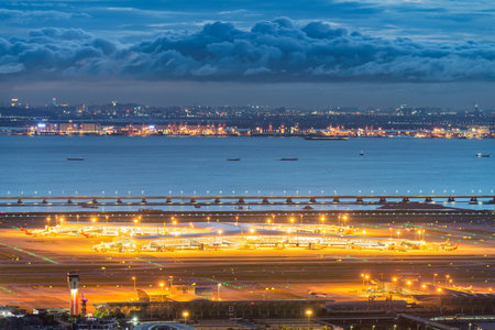 Aerial view of the Hong Kong International Airport at night time.の写真素材