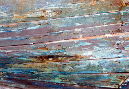 detail of colorful planking on an old fishing boatの写真素材