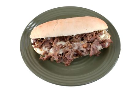 sizzling cheesesteak sandwich on whiteの写真素材