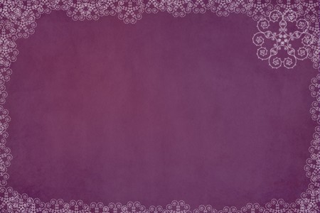 Christmas snowflake border on a purple grunge backgroundの写真素材