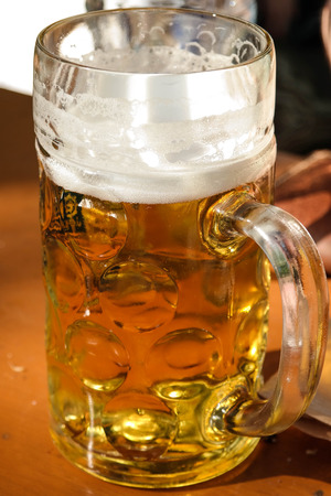 a liter of beer in munich beer gardenの写真素材