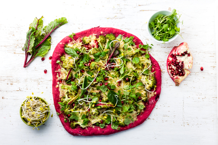 Purple beetroot dough, vegetables and sprouis pizza, Healthy fast foodの写真素材