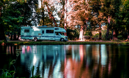 Family trip in motorhome in forest or park in South Chileの写真素材