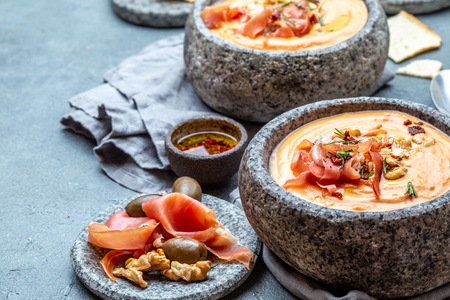 Spanish cold tomato soup Salmorejo. Traditional tomato soup with white bread and olive oil.の写真素材