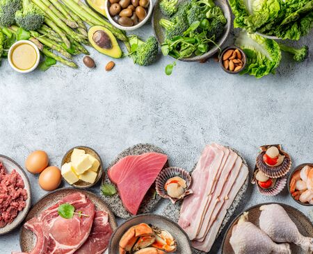 KETOGENIC DIET LOW CARB CONCEPT. Vegetarian and animal protein, carb and fat sources. Healthy food background with copy space.の写真素材