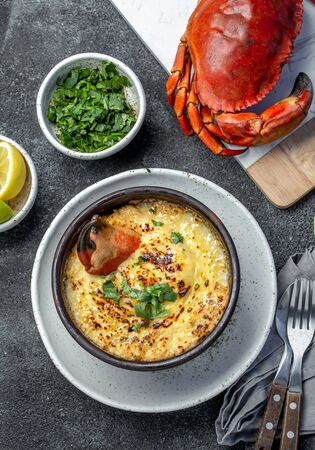 CHILEAN FOOD.  Baked crabmeat crab meat with cheese, cream and bread.  Traditional dish of chilean coast. Pastel o chupe de jaibaの写真素材