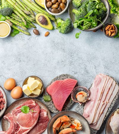 KETOGENIC DIET LOW CARB CONCEPT. Vegetarian and animal protein, carb and fat sources. Healthy food background with copy space.の写真素材