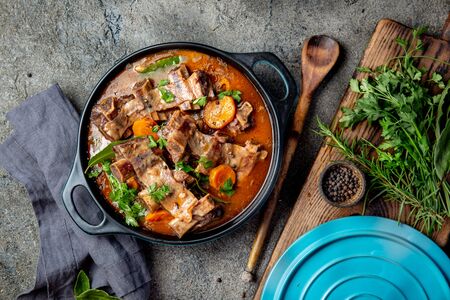 Beef ribs Bourguignon. Beef ribs stewed with carrot, onion in red wine. France dishの写真素材