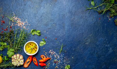 Food background with spices, garlic and olive oil.の写真素材