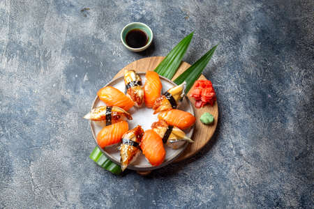Sushi and rolls sets Japonese food. top view gray backgroundの写真素材
