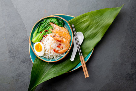 Asian rice noodles with shrimps on gray backgroundの写真素材