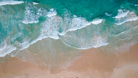 Aerial view drone over beach sea. Beautiful sea waves. Beach sand and amazing sea.
