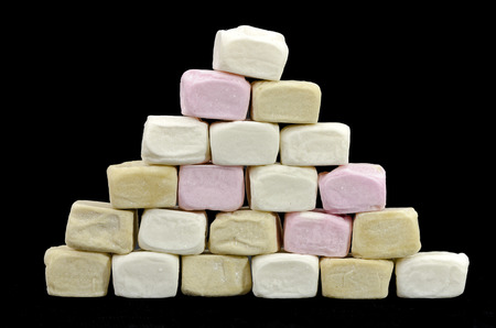 Pyramid made from different colored marshmallow cubesの写真素材