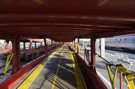 interior view of a row of empty car train waggons of the Austrian Federal Railway at station...
