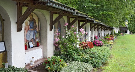 Rich decorated traditional tirolean graves at the church of St. Andrew in Lienz, Tyrol, Austriaのeditorial素材