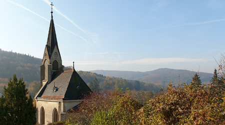 sunny autumnally scenery at the surrounding of Vienna with a cemetery chapel, Austriaの写真素材