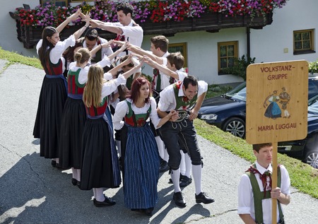 MARIA LUGGAU, AUSTRIA - AUGUST 23, 2015: dancers  of the folk dance group Maria Luggau at the parish fair, Carinthia, Austria, 2015のeditorial素材