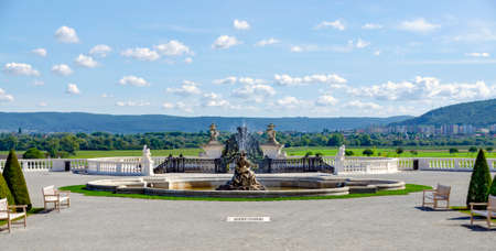 Panoramic view across the third parterre of the baroque garden of the palace Schlosshof in Austria across the border onto the town of Bratislava in Slovakiaのeditorial素材