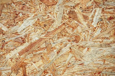 Chipboard - glued pieces of wood, backgroundの写真素材