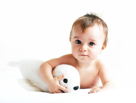 Little boy playing with a sealの写真素材