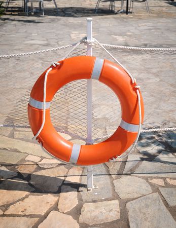 Rescue orange circle and white netting .