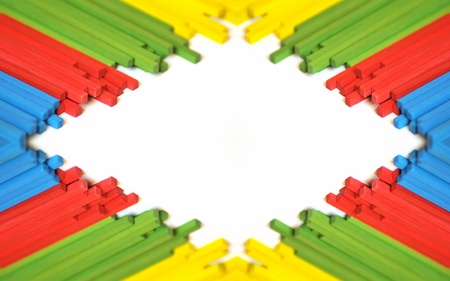 The blue, red, green and yellow wooden sticksの写真素材