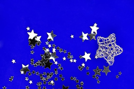 The silver stars on the blue background .の写真素材