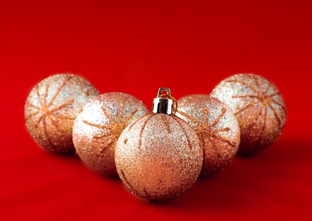 Christmas balls on the red background .の写真素材