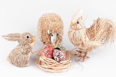 The rabbit, cock, sheep and nest with eggs .