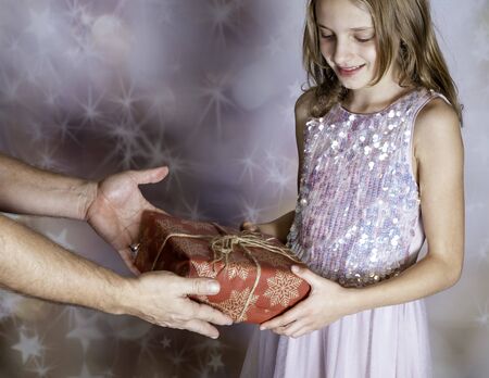 The girl has a gift from fatherの写真素材