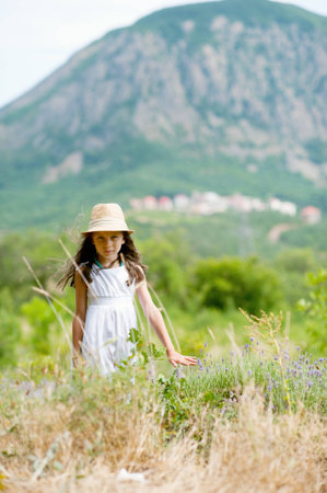 Adorable little girl in a lavender field の写真素材