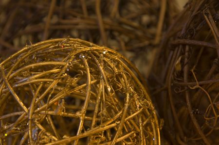 Stack of earth tone wicker ball ornamentsの写真素材