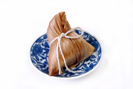 Steamed rice dumpling on white background の写真素材