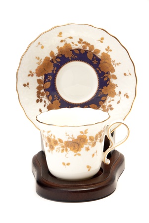A antique tea cup  on white backgroundの写真素材
