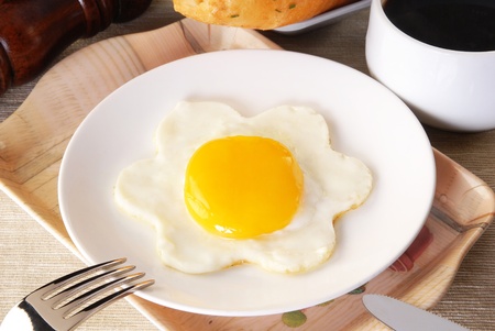 Fried egg in the shape of a flowerの写真素材