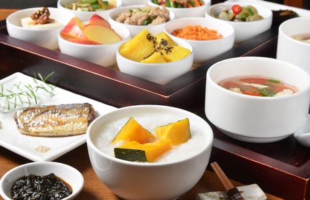 Traditional chinese  rice  porridge on dinner table  のeditorial素材