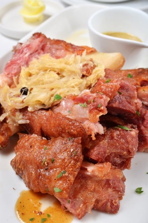 German BBQ pork knuckle on white plate    の写真素材