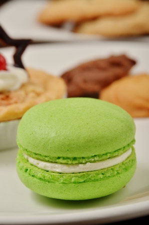 Delicious macarons on white  plateの写真素材