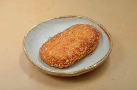 A Japanese deep fried dish , Japanese croquette  の写真素材