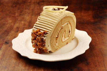 Coffee and Walnut cake on the plate の写真素材