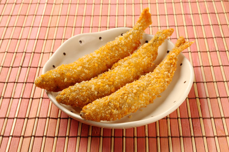 Deep fried shishamo fish  on white plate