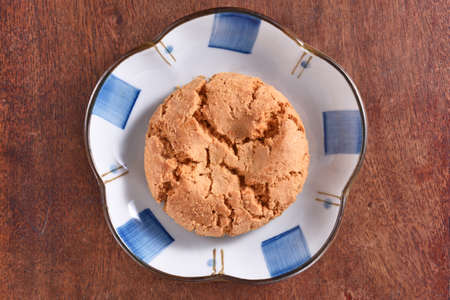 Crisp walnut cookie on the plateの写真素材