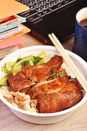 Taiwanese chicken drumstick bento on wooden table
