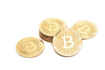 Stacks and heaps of bitcoin coin crypto money on white backgroundの写真素材
