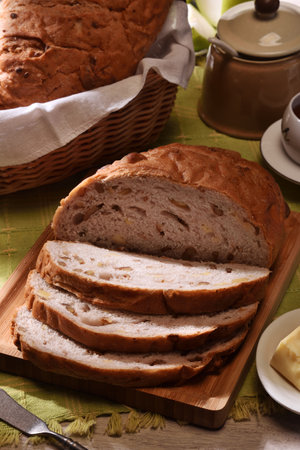 cheese walnut bread on a cutting boardの写真素材