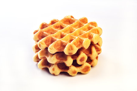 Belgian waffles on a white background. Selective focus.の写真素材
