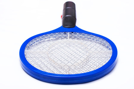 Electric mosquito swatter on white backgroundの写真素材