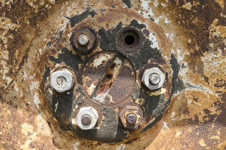 old rusty wheel nuts texture - Beautiful texture of rusty old wheelの写真素材