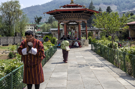 Tourists and Bhutanese people gather around the National Memorial Chorten located in Thimphu, Bhutan for prayer and blessing.のeditorial素材